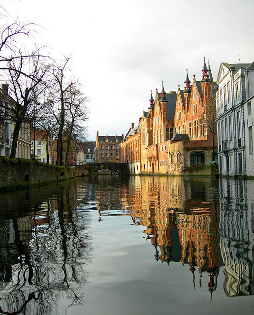 Reflections on the canals of Bruges, Belgium