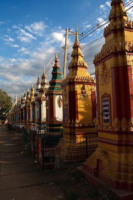 Stupas in a Line at Vat Tham Fai temple in Pakse, Laos