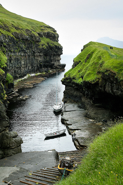 A small bay allows boats to dock in Eysturoy, Faroe Islands