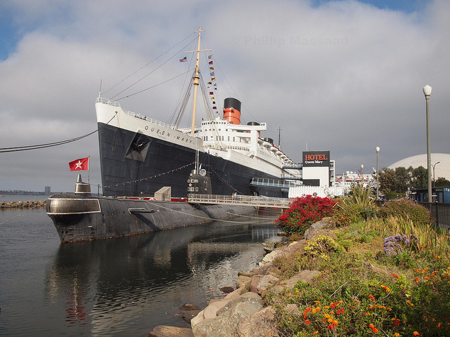 RMS Queen Mary in Long Beach, California. This once famous luxury cruise liner was converted in a hotel in 1967, but many passengers and crew members from its sailing days still haunt the ship. The...