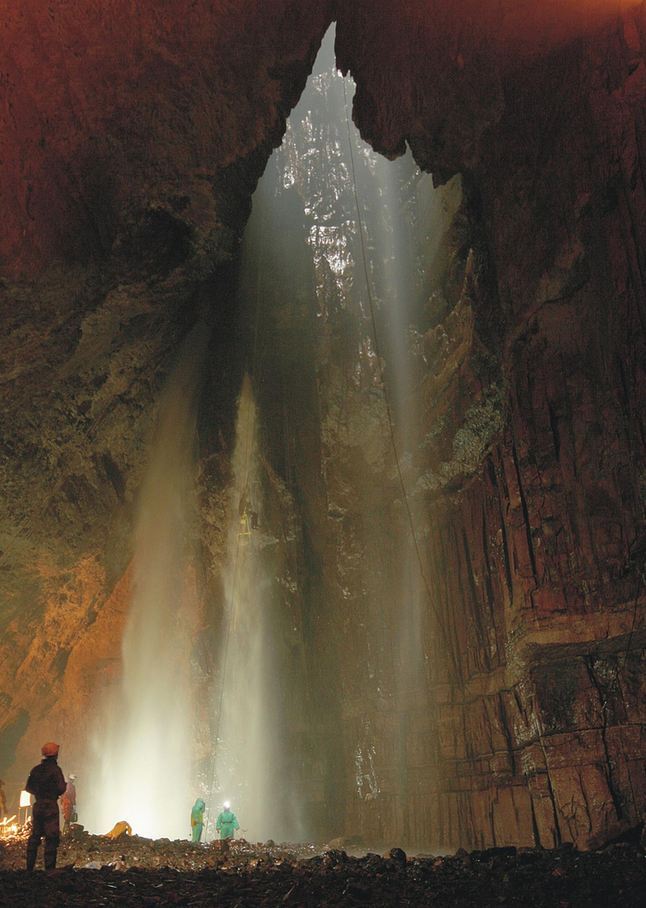 “Cavers in the Main Chamber of Gaping Gill, North Yorkshire / England .”